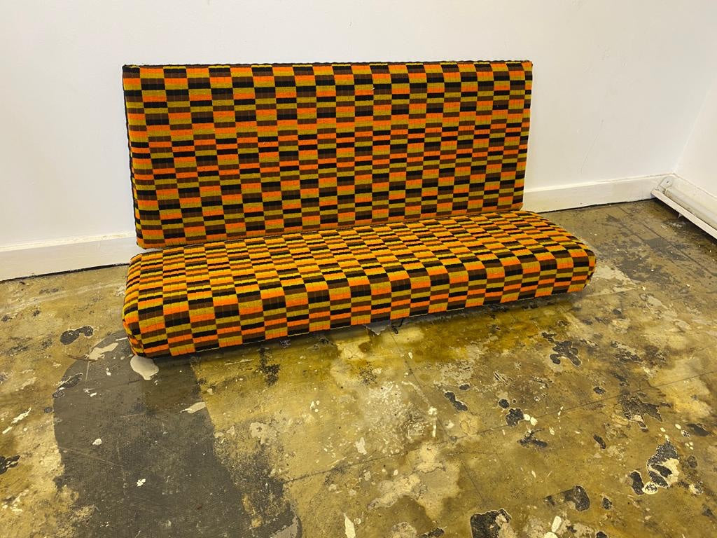 Modern bench upholstered in orange yellow and brown Misha Black fabric