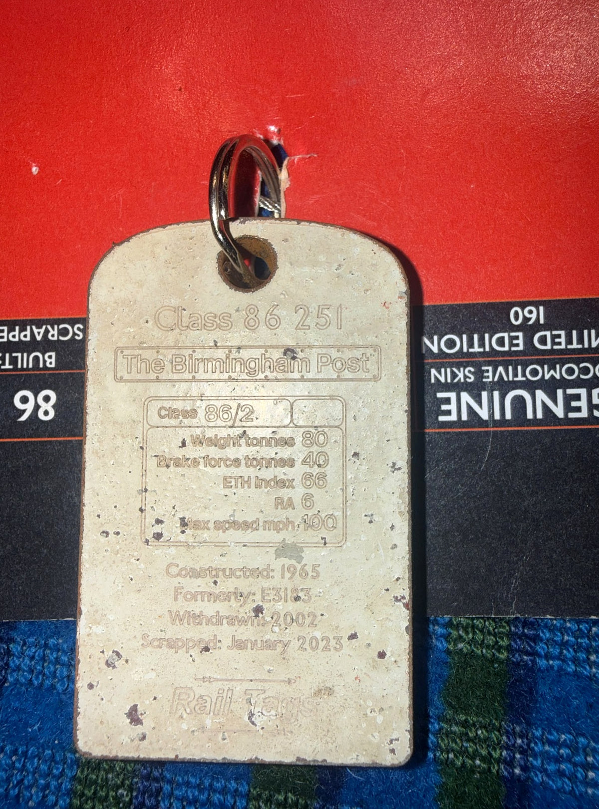 Reverse side of Class 86 251 railway metal Railtag